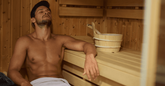 Athlete using a sauna as part of a hot and cold contrast therapy routine