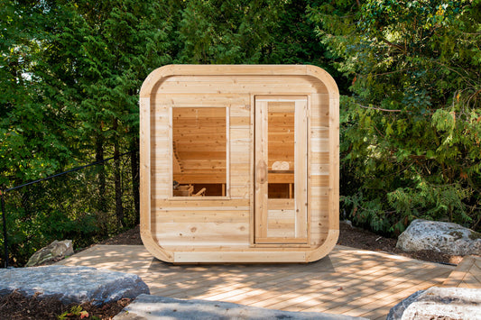 Outdoor garden sauna cabin with a large window, set on a timber deck