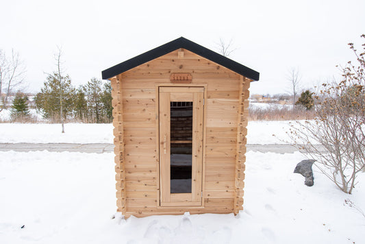 Sauna cabin set on a prepared site, ready for connection