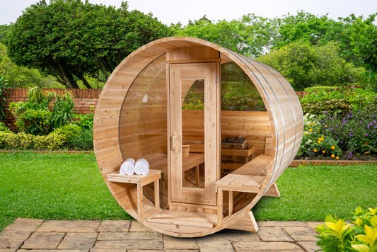 Outdoor barrel sauna with a chimney, the natural setting for a wood-burning sauna stove